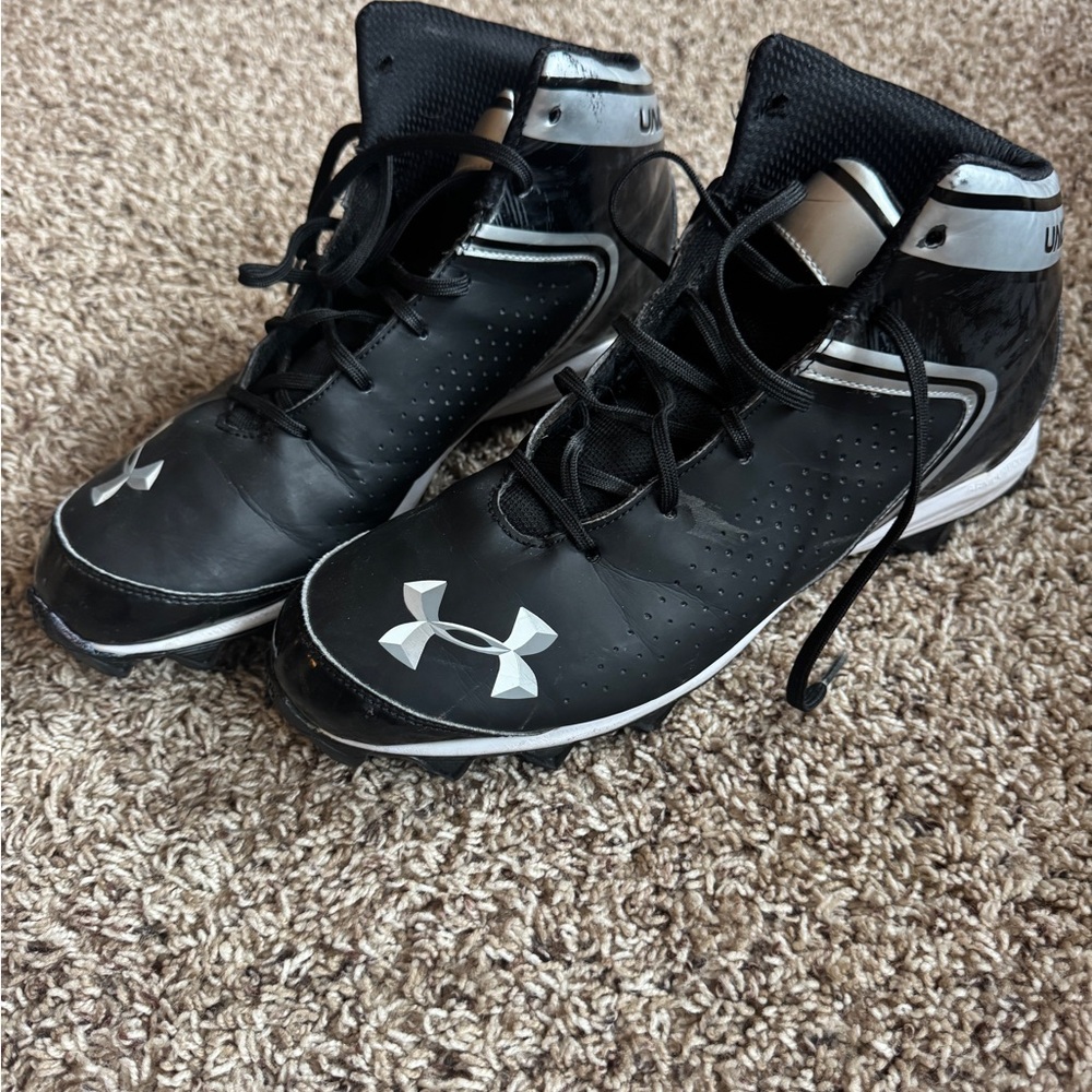 Under Armour Black and White High-Top Sports Cleats